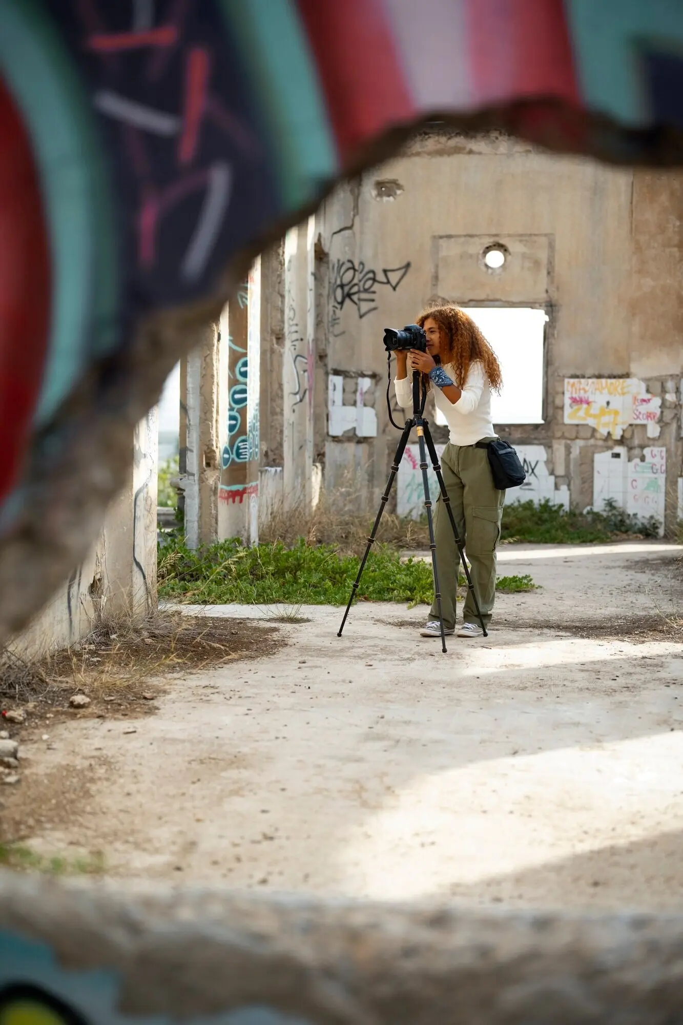 Photographer exploring an abandoned place